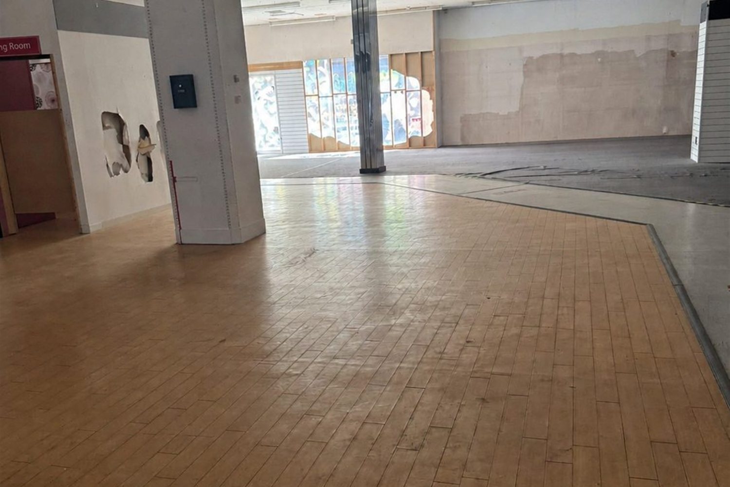 Timber floor cleared and brushed down