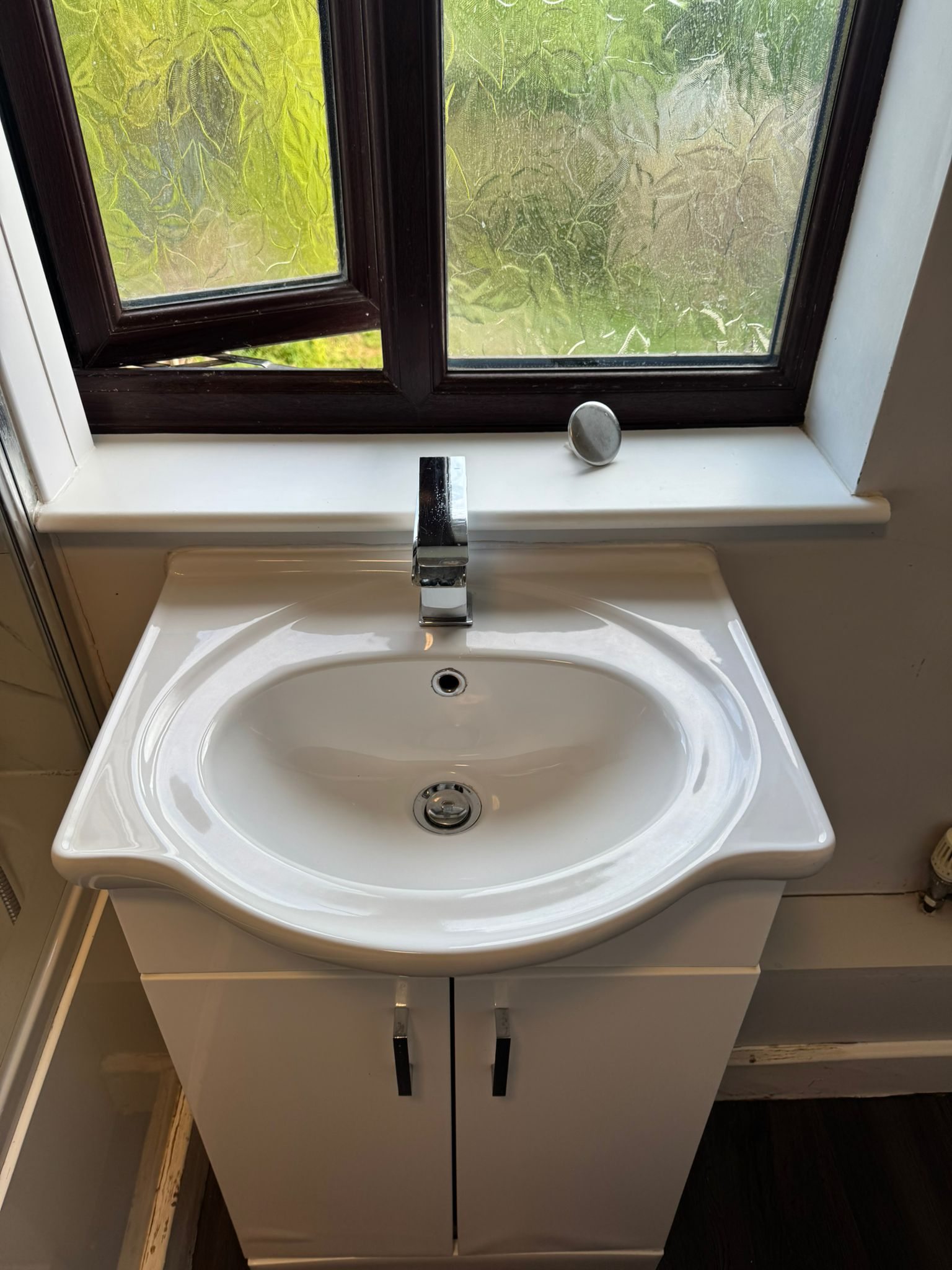 Basin and fittings cleaned
